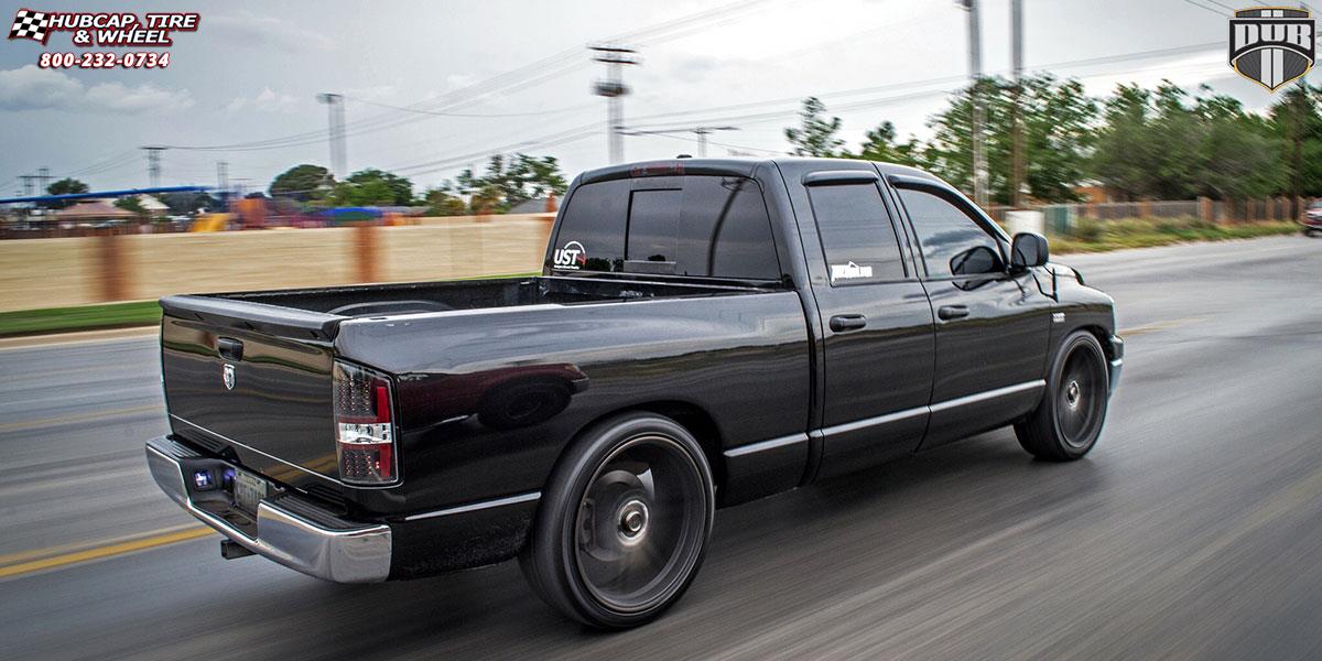 vehicle gallery/dodge ram 1500 dub skillz s123 24X10  Black & Machined with Dark Tint wheels and rims