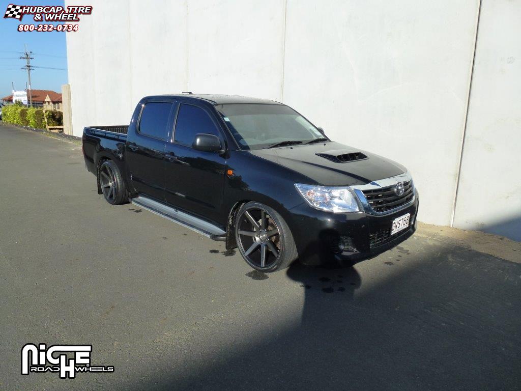 vehicle gallery/toyota hilux niche verona m150  Black & Machined with Dark Tint wheels and rims